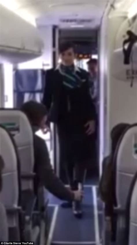 WestJet flight attendant performs 'Uptown Funk' dance moves before take-off | Daily Mail Online