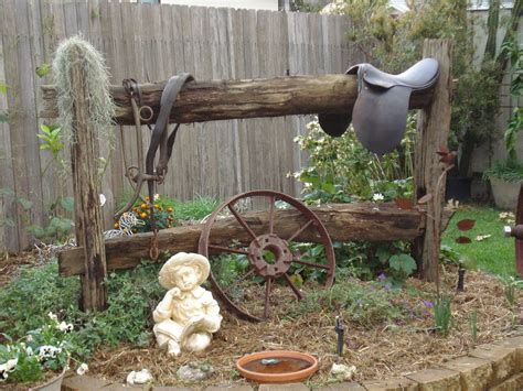 Old saddle on fence | Diy garden decor, Rustic garden fence, Rustic garden decor