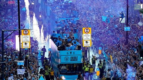 Man City celebrates winning treble of major trophies with open-top bus ...