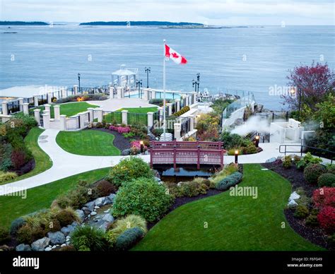 A view of the seaside gardens and spa of the Oak Bay Beach Hotel, Haro Strait, and Salish Sea ...