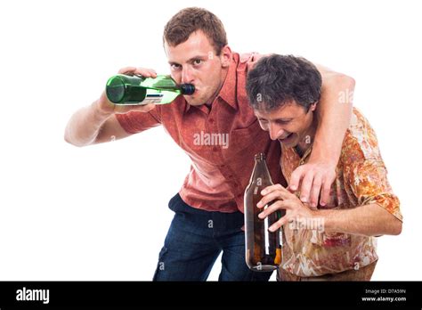 Two funny drunken men with bottle of alcohol, isolated on white background Stock Photo - Alamy