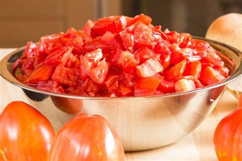 Learn how to can diced tomatoes and you will save time, money, and be ...