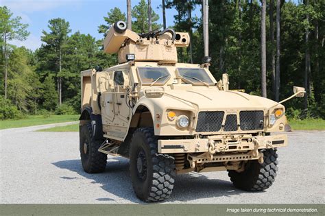 An Oshkosh Joint Light Tactical Vehicle (JLTV) with the new reconfigurable Moog RiWP turret ...