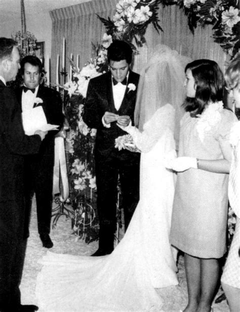 Elvis trying to get the ring steady to place on Cilla's finger..sweet ...