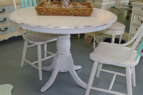 Coastal Chic Boutique: Distressed White Round Dining Table - SOLD