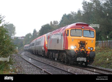 A class 57 Thunderbird hauls a Virgin Trains Pendolino. 2004 Stock Photo - Alamy