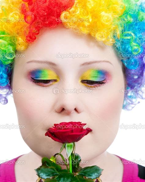 rainbow makeup | Clown with rainbow make up smelling rose - Stock Image | Rainbow makeup, Makeup ...