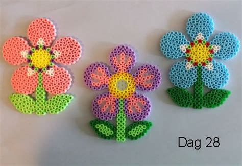 Spring flowers hama beads by Sylvana | Perler bead patterns, Pyssla beads design, Perler bead art