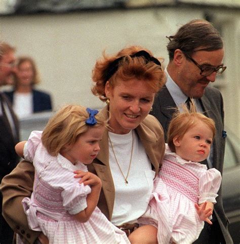 The Duchess of York, carrying her daughters Princesses Beatrice and ...