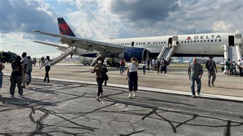 Tire on Delta flight pops while landing in Atlanta, 1 person injured ...