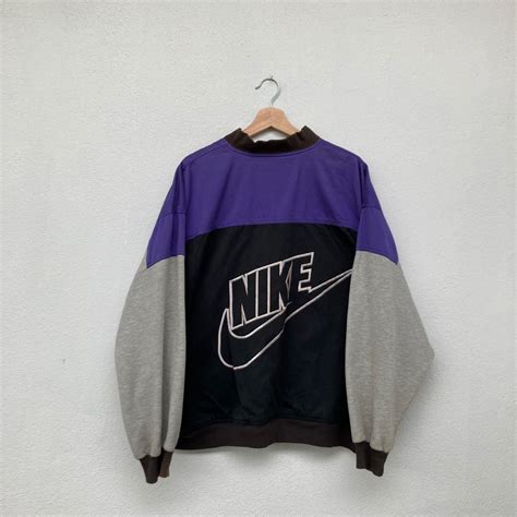 Nike big swoosh varsity jacket, Men's Fashion, Coats, Jackets and Outerwear on Carousell