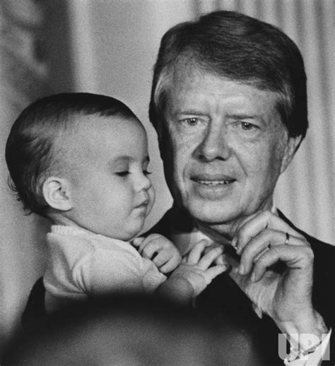 Photo: President Jimmy Carter shows off grandson James Earl Carter III - ARKJCF19790309032 - UPI.com