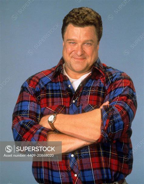 JOHN GOODMAN in ROSEANNE (1988). - SuperStock