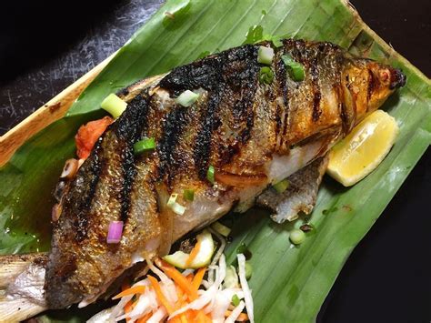 Inihaw na Bangus is simply grilled milkfish, but what sets it apart is ...