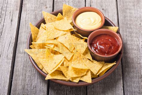 Crispy chips nachos with tomato and cheese sauce | Stock image | Colourbox