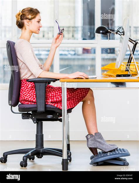 Right posture for working at a computer Stock Photo - Alamy