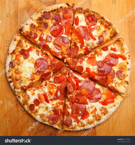 Pepperoni Pizza Cut Into Slices Stock Photo 62119870 : Shutterstock