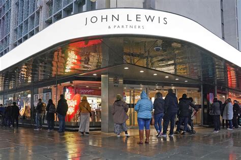 John Lewis Partnership says turnaround to take extra two years after £ ...