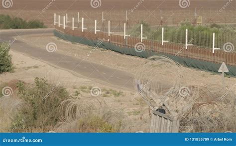 Border Fence between Israel and West Bank. Barbed Wire Electronic Fence ...