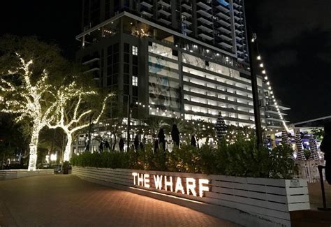 Two months after unmasked young people swarmed the first reopening of the Wharf Fort Lauderdale ...