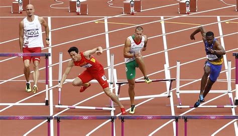 London 2012 hurdles: Liu Xiang out of 110 hurdles after fall ...