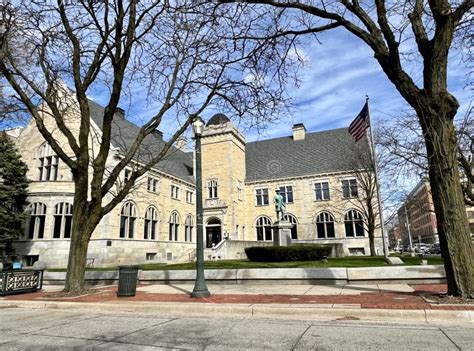 Joliet Public Library Main Branch with Statue of Explorer Louis Joliet, Founder of City Og ...