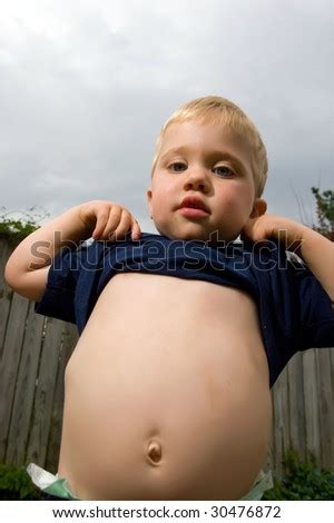 Little Boy Lifting His Shirt And Exposing His Belly Stock Photo 30476872 : Shutterstock