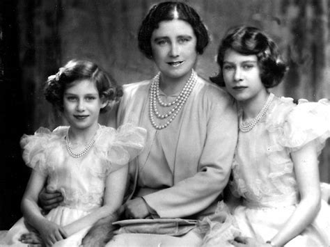 The Queen Mother, Elizabeth, with daughters Princess Elizabeth, right, and Princess Margaret in ...