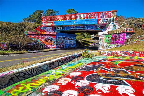 ++ written in graffiti on a bridge in the park - #The Expert