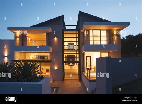 Modern house illuminated at night Stock Photo - Alamy