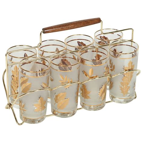 Vintage Charm: Set of Eight Mid-Century Glasses in a Stylish Brass Cart