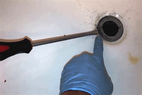 How To Remove A Broken Bathtub Drain Stopper? - LivingProofMag