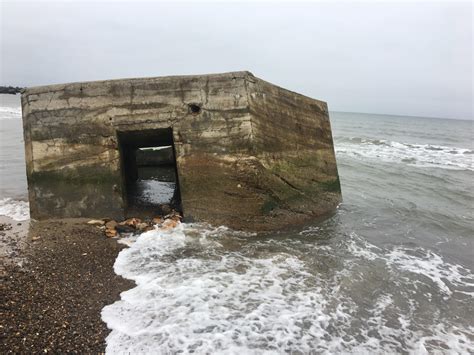 An abandoned WW2 bunker off the coast of northwestern Denmark. One of ...