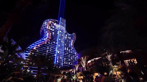 Hard Rock opens neon, guitar-shaped hotel in Florida