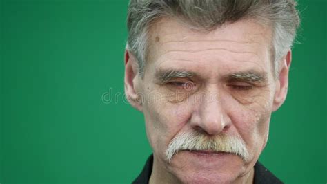 Sad Senior Man Isolated on Green Background. Close Up Studio Portrait Stock Video - Video of ...