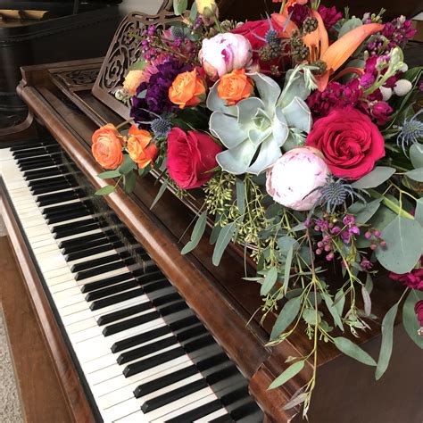 Flowers on a piano... two of my favorite things. Flowers by Wright Flower Company in Springville ...