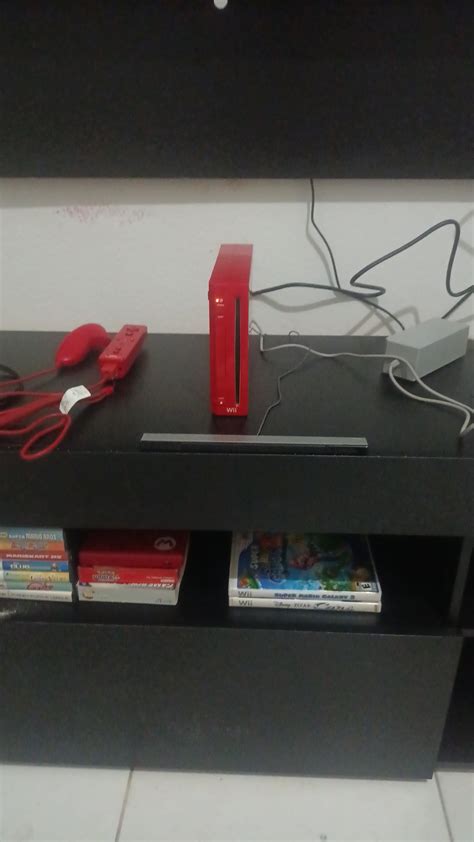 I bought myself this red Wii. First time adopter as videogames weren't ...