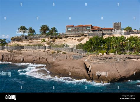 Tenerife Bahia del Duque Costa Adeje the Duke's Castle and rocks Stock Photo - Alamy