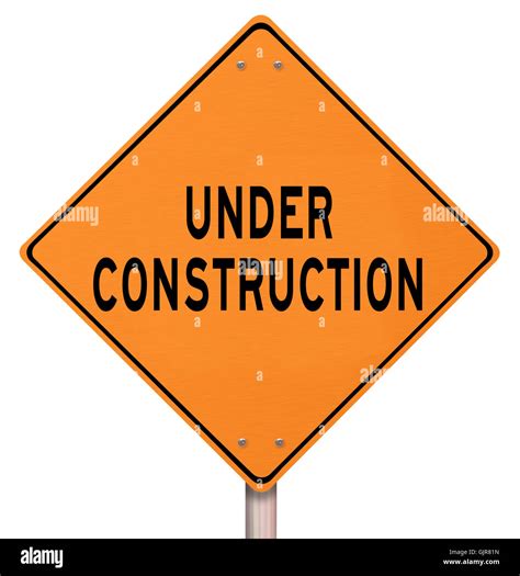 Orange Warning Sign - Under Construction Stock Photo - Alamy