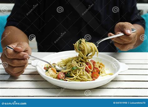 Man Hands Holding Fork and Spoon during Eating Spaghetti Stock Photo ...