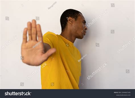 Dissatisfied Young Man Showing Stop Sign Stock Photo 2244407345 | Shutterstock