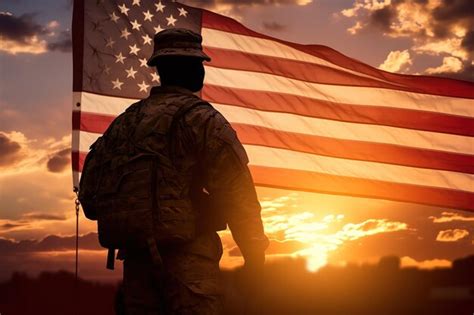 Premium Photo | Silhouette of a soldier on the flag of the united ...