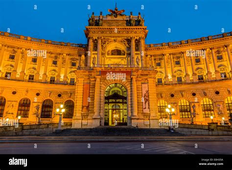 Austria, Vienna, view to lighted Hofburg Palace at twilight Stock Photo ...