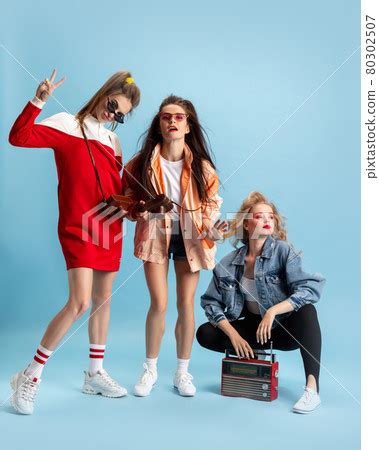 Three Young Attractive Women In Retro 90s Fashion Style Outfits Posing ...