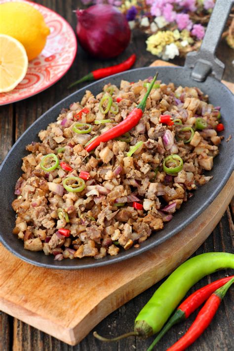 Authentic Kapampangan Sisig recipe using pork belly - Foxy Folksy