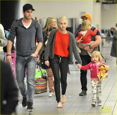 Full Sized Photo of miley cyrus liam hemsworth take flight with the family 03 | Photo 2792148 ...