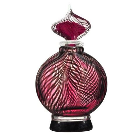 perfume bottle Features: -Made with hand blown art glass. Product Type ...