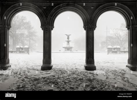 Bethesda Fountain in Central Park in Black & White, during a winter snowstorm. Blizzard in ...