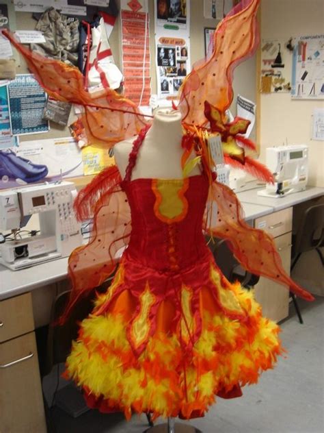 Image by A T on Elements dance | Fire costume, Fairy costume, Goddess ...