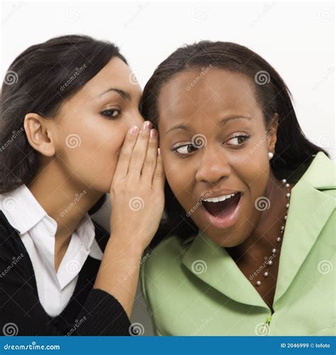 Woman whispering in ear stock image. Image of hand, businesswomen - 2046999